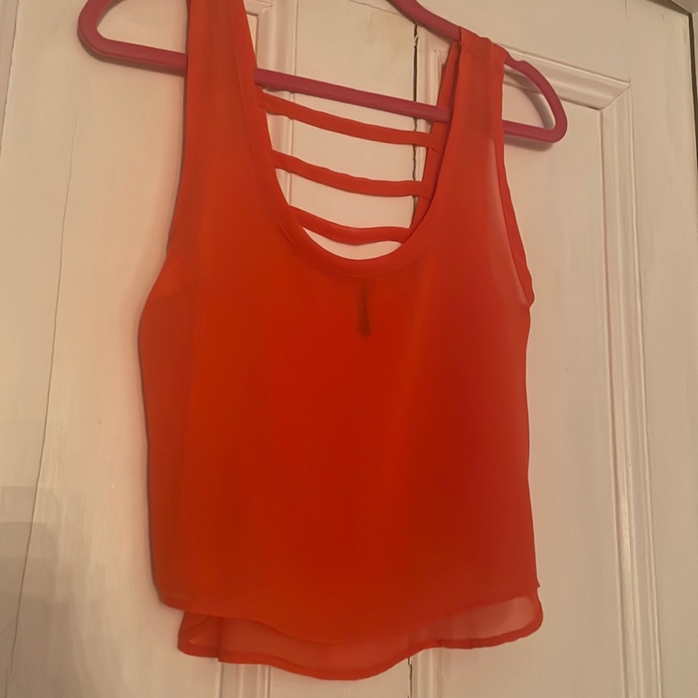 Bright orange top